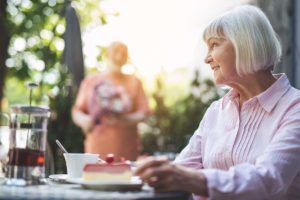 woman enjoying senior living amenities