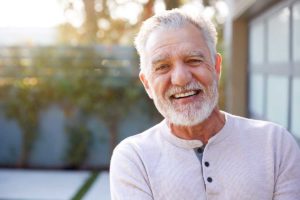 senior man smiling in senior living community