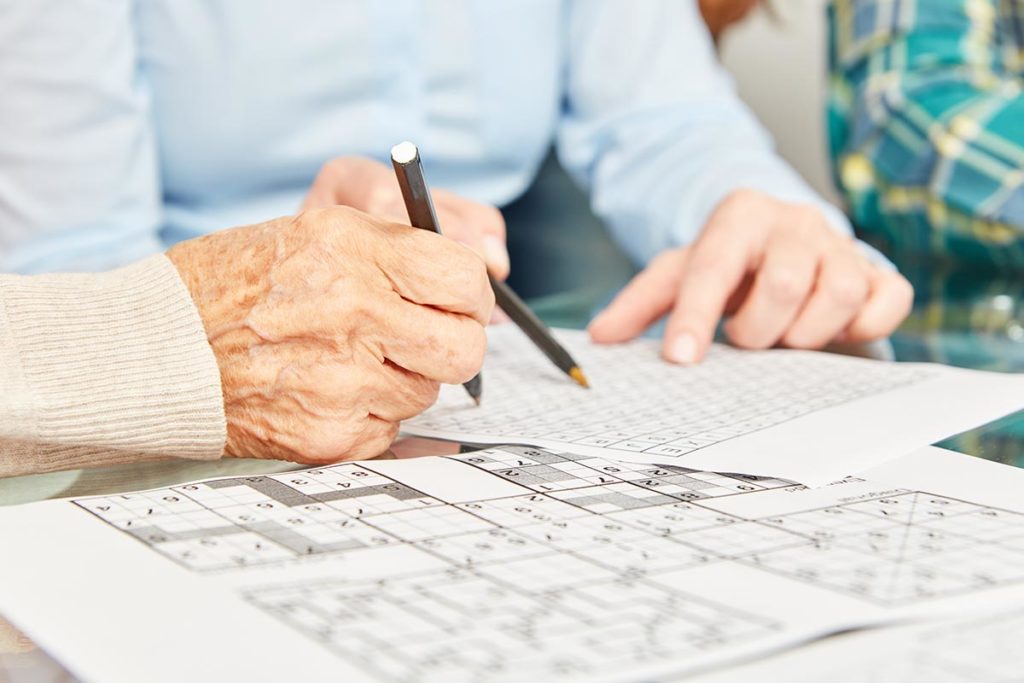 two older people do mental exercises for seniors and brain exercises for seniors