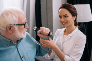 a nurse performs Short-Term Senior Rehabilitation Therapy with a resident