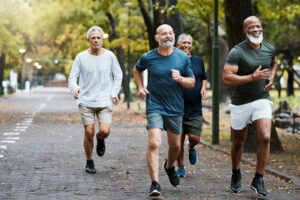 a group in one of many Senior Recreational Programs jogs down a road