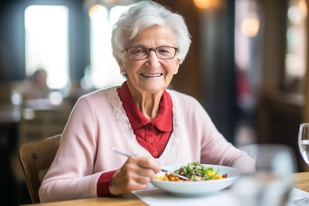 a senior eats a nutritious meal, one of the benefits of assisted living