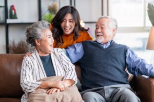 a nurse talks to a senior couple about the average memory care age