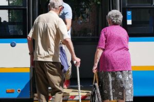 seniors get on a bus after asking Do Retirement Communities Have Transportation Services?